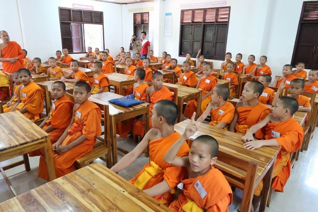 A full class of students in the completed school